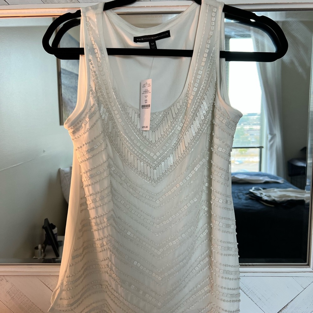 Two White House black-market dress tank tops